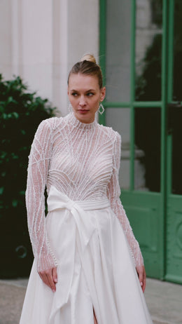 Exquisite A-Line Wedding Dress With Satin Skirt, Beaded Bodice, Illusion Tulle Long Sleeves, Bow At Waist, Cathedral Train