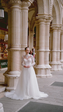 Ball Gown Wedding Dress with Lace Appliqués, Illusion High Neckline, Long Sleeves, Tulle Skirt and Cathedral Train