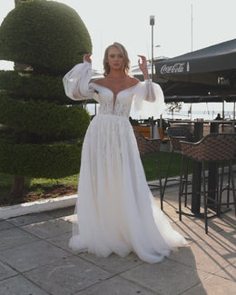 Gorgeous A-Line Wedding Dress with Detachable Voluminous Sleeves, Tulle Drapery, and Beaded Appliqués with Sequins