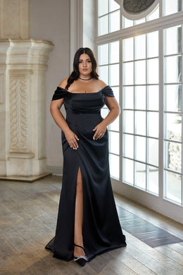 Black evening dress with an off-the-shoulder neckline, fitted silhouette, and high front slit