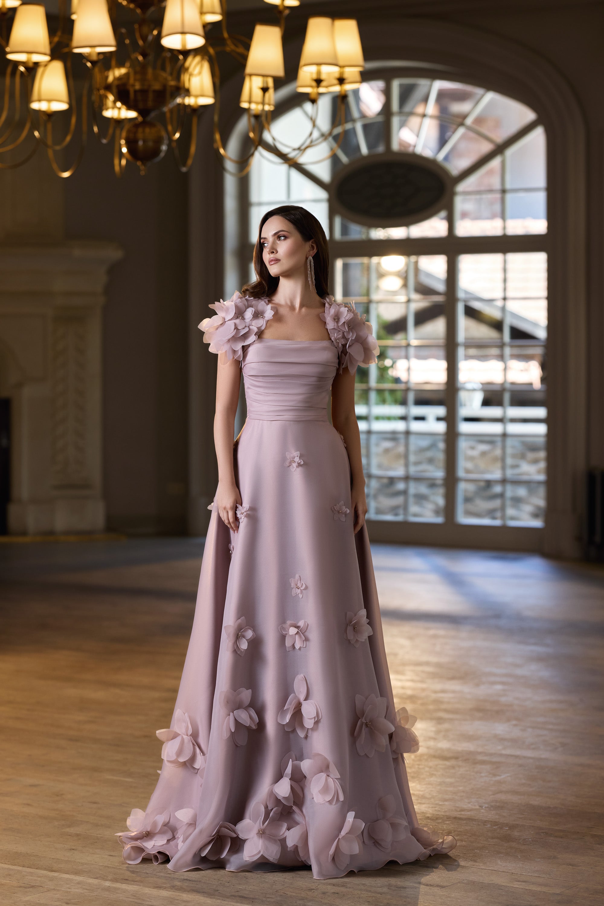 Mauve floor-length evening dress with a ruched bodice, floral shoulder details, and 3D flower appliqués