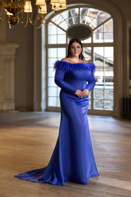 Sapphire blue evening dress with a feather-trimmed off-the-shoulder neckline and long flowing train