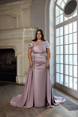 Mauve evening dress with an off-the-shoulder draped neckline, ruched bodice, and sweeping train
