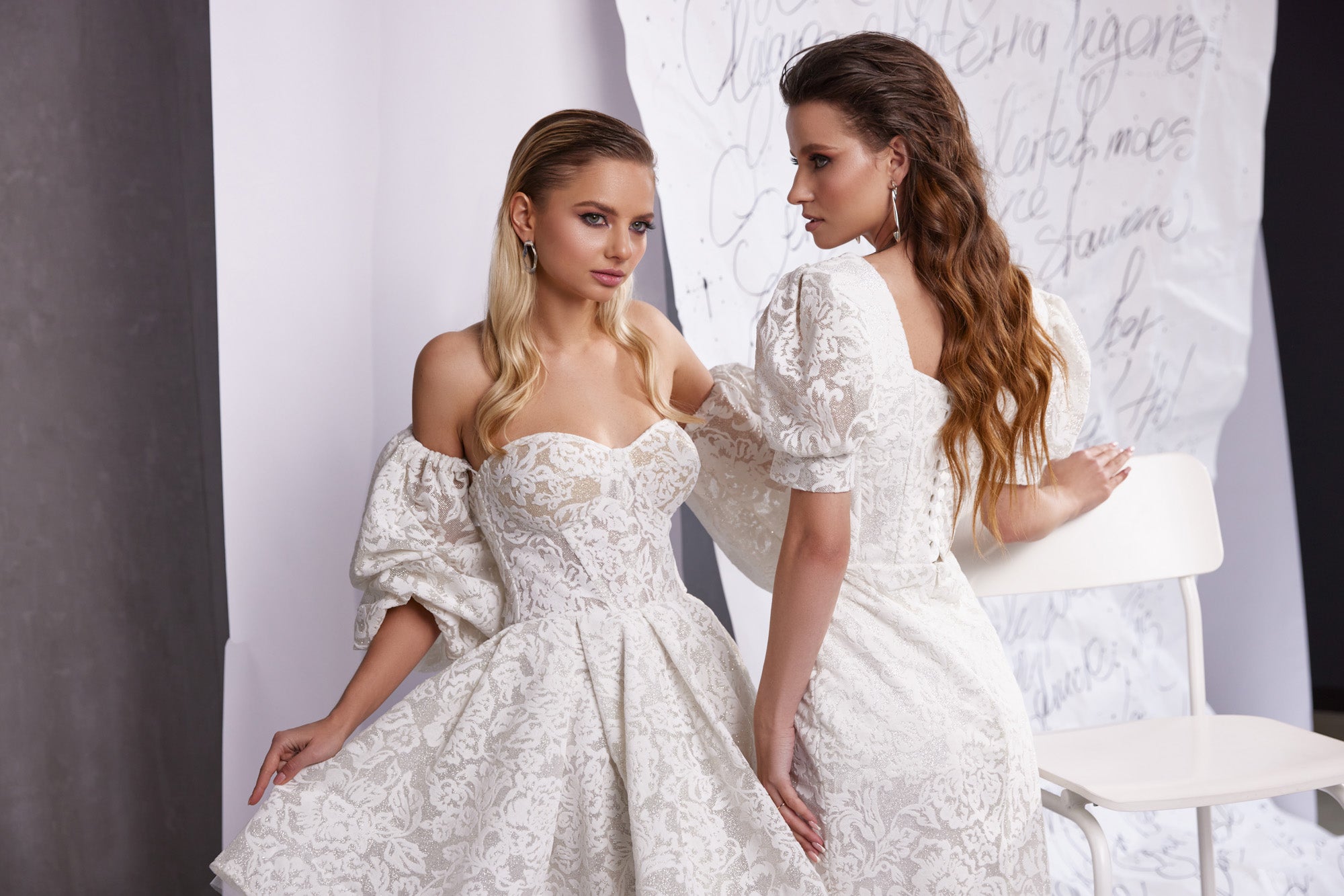 White lace evening dress with puff sleeves and a fitted silhouette, shown from the back and side