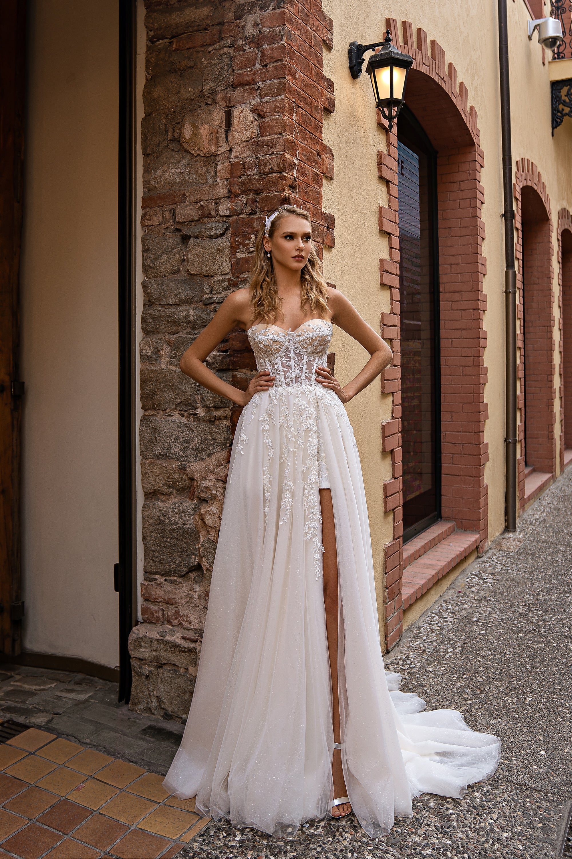 Modern Off-the-Shoulder Wedding Dress with Embroidered Floral Appliqués, Glitter Layers, and Lacing at the Back