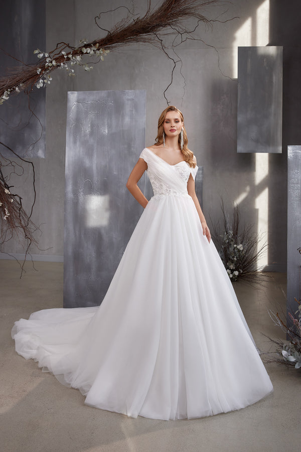 Designer Wedding Dress with Asymmetrical Yoke, Puffy Skirt, and Train - Translucent Tulle Fabric, Fold Drapery, Crystal Winglet, Guipure Embroidery, Beads, and Sequins - With Pockets