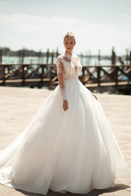 Elegant Bridal Gown Ball Gown with Tulle Skirt Decorated with Lace, Long Lace Sleeves, and Beaded High Neck