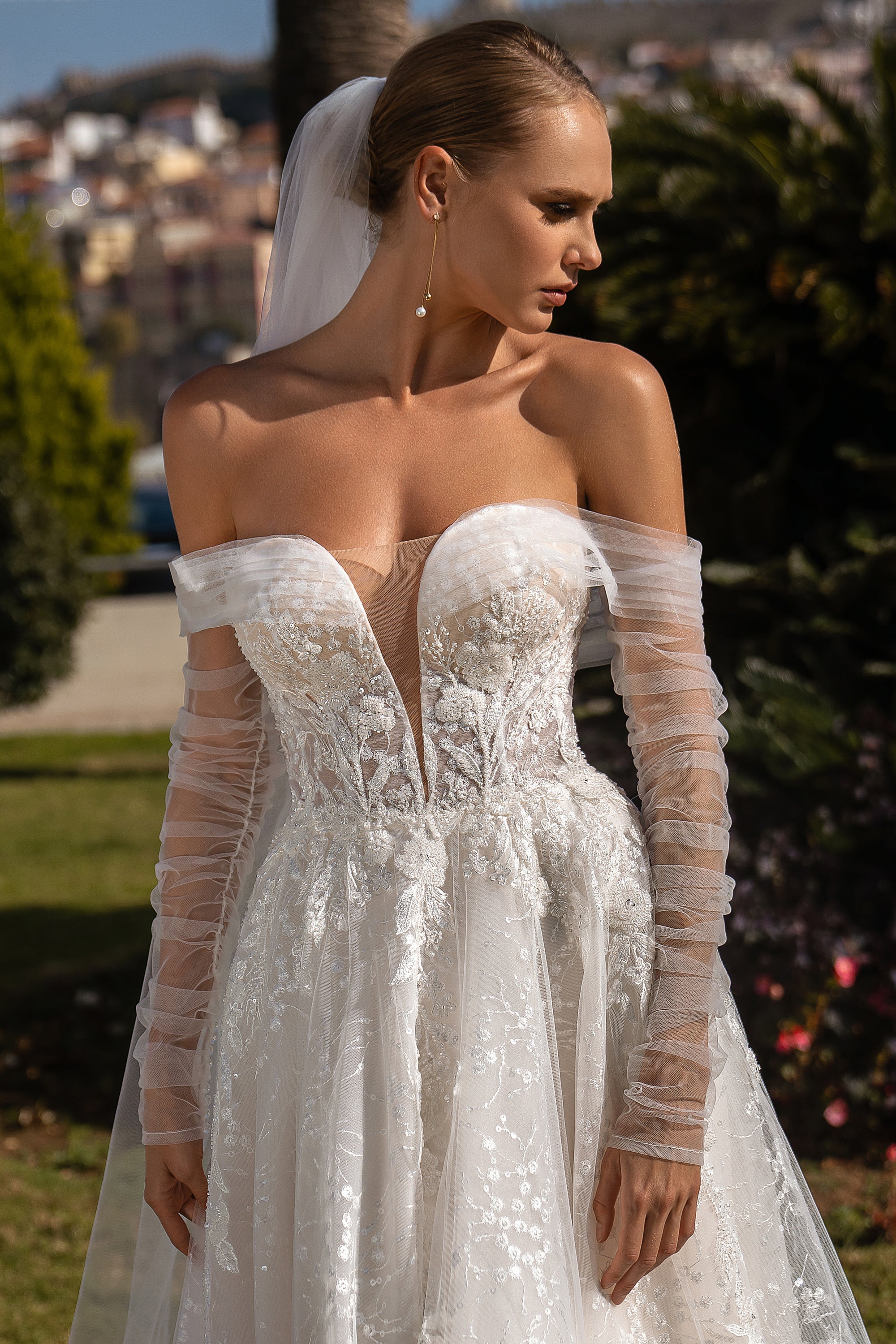 Luxurious Off-the-Shoulder Wedding Dress with Detachable Draped Sleeves and V-Neckline - Embroidered Guipure with Sequins and Soft Tulle Bodice with Beaded Appliqués