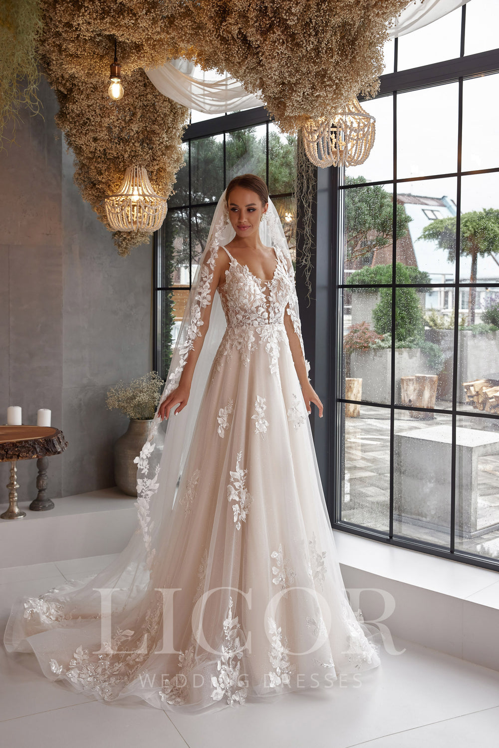 Romantic A-Line Wedding Dress with Tulle, Lace Appliqués, Sweetheart Neckline, Illusion Long Sleeves, Cathedral Train