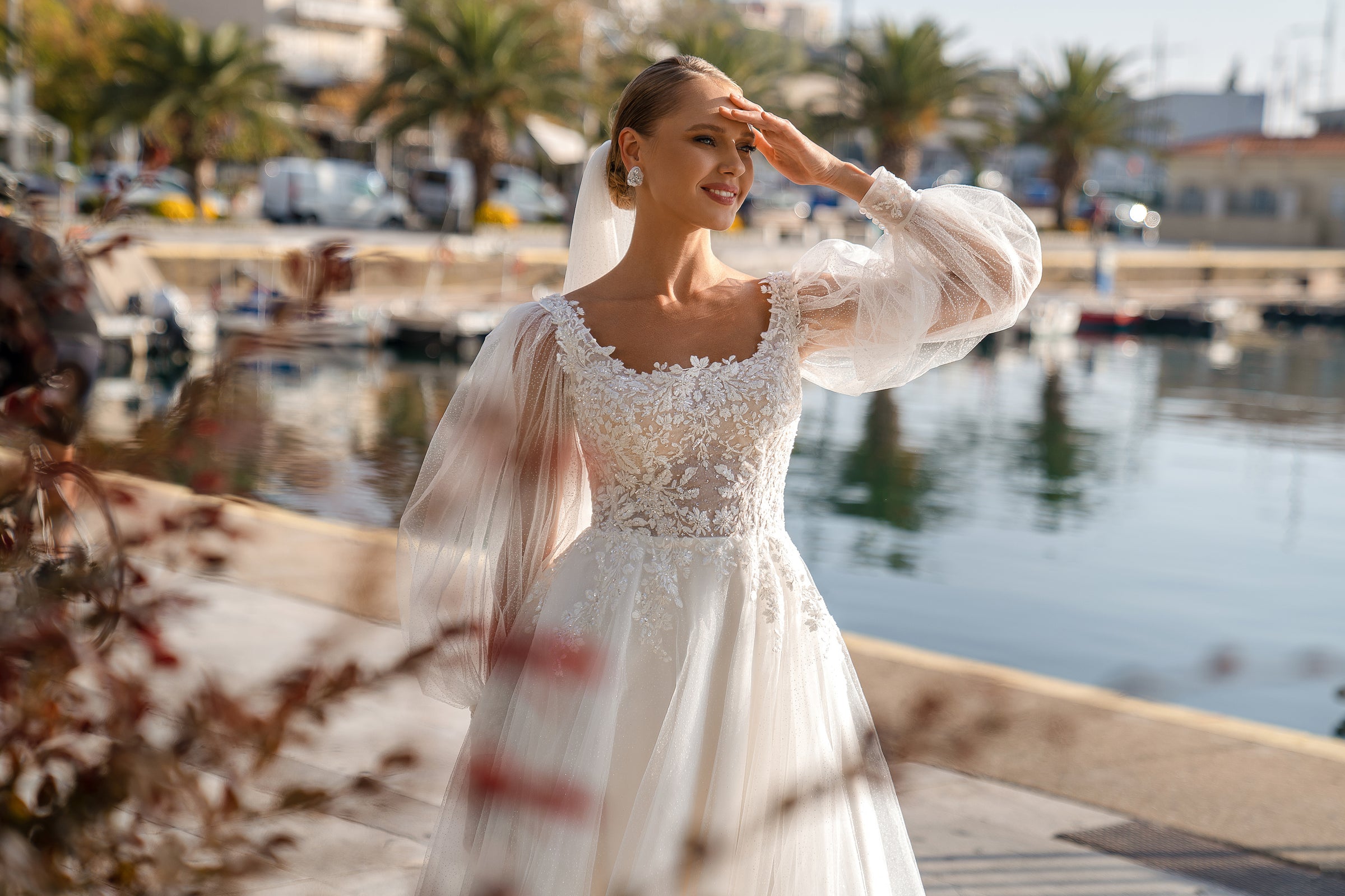 A-Line Wedding Dress with Detachable Voluminous Sleeves and Sparkling Tulle Skirt with Train