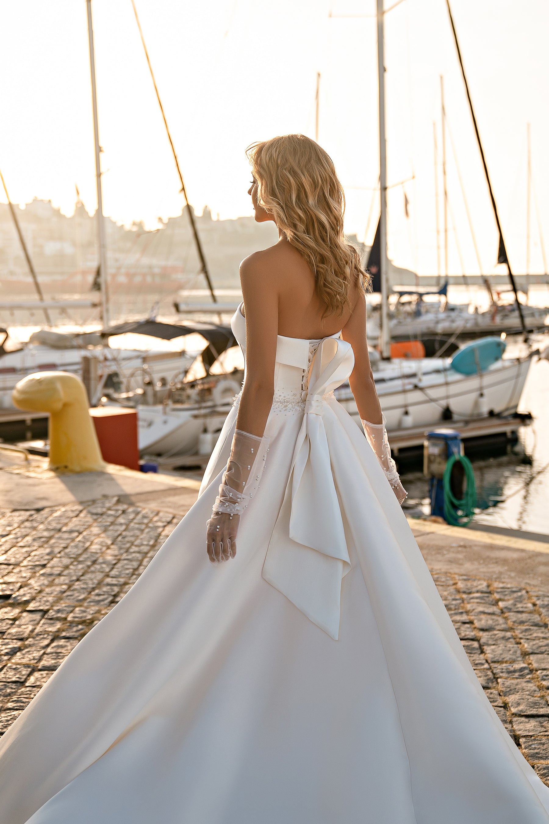Mikado Ball Gown with Modern Corset Design, Hand-Embroidered with Pearls and Beads, Short Transparent Sleeves with Pearls, and Voluminous Bow at Back
