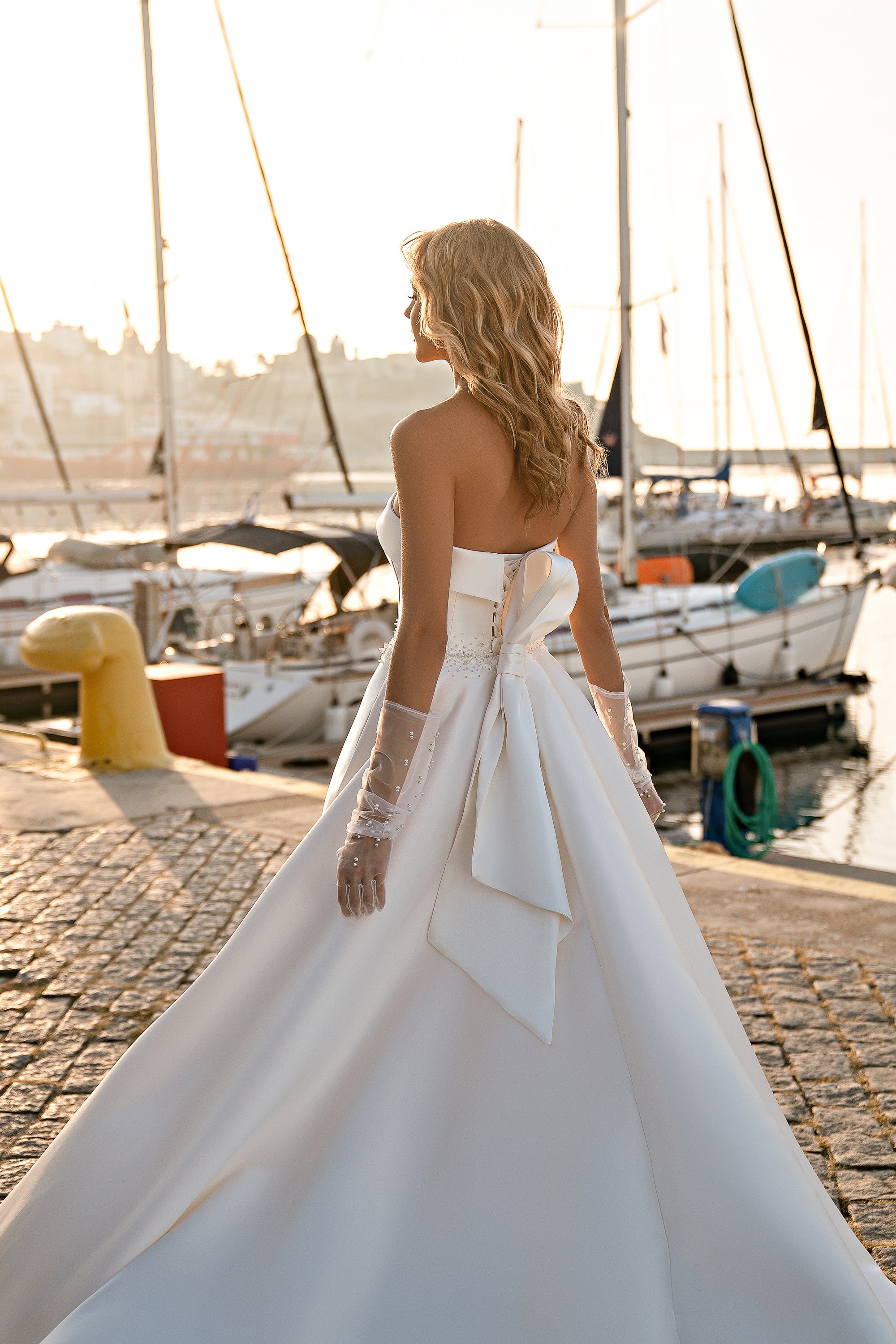 Mikado Ball Gown with Modern Corset Design, Hand-Embroidered with Pearls and Beads, Short Transparent Sleeves with Pearls, and Voluminous Bow at Back