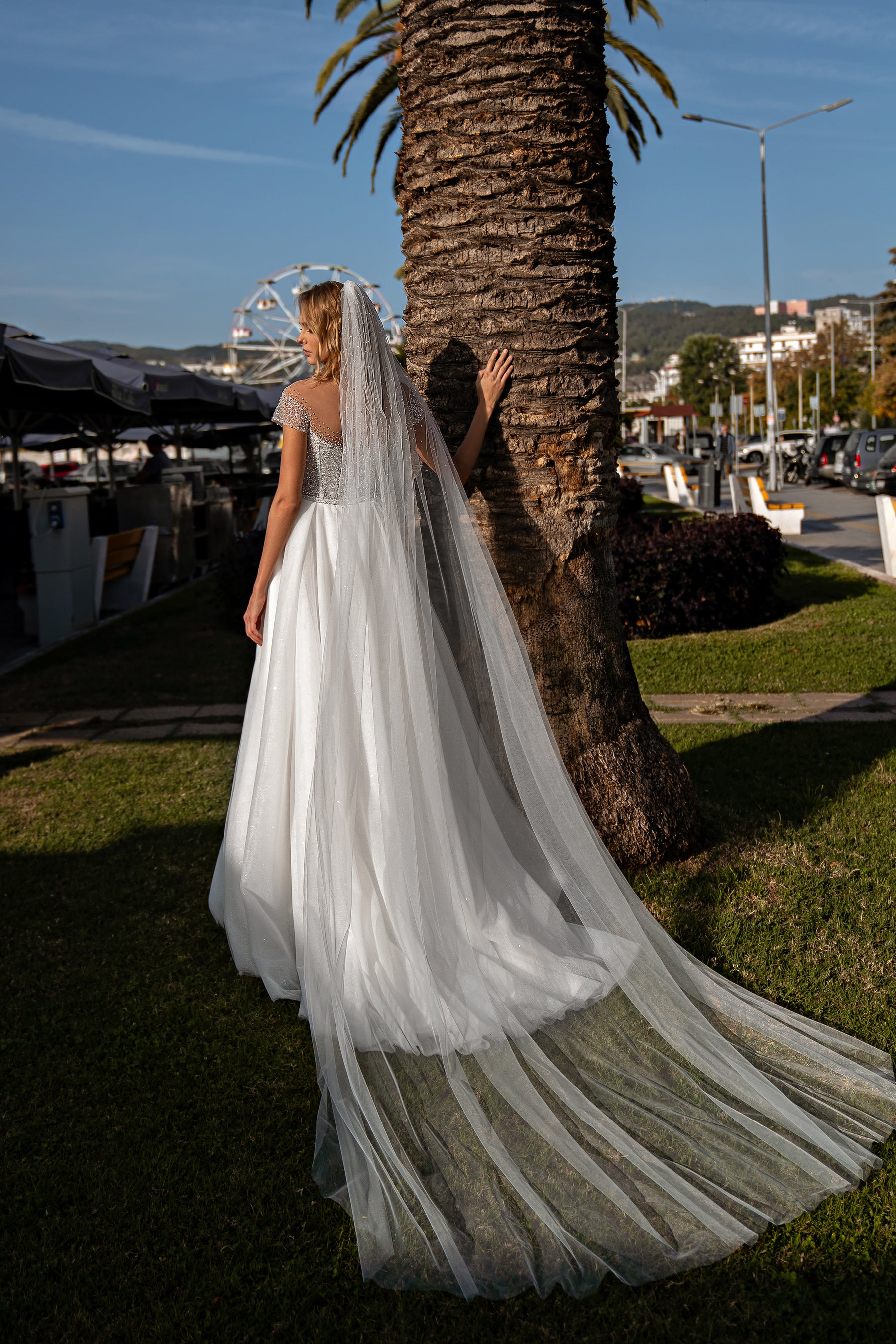 A-Line Wedding Dress with Over 1,000 Handmade Beads, Crystals and Sequins, Semi-Sheer Bodice, Hidden Lacing, Short Sleeves, Sequined Tulle Skirt and Thigh-High Slit