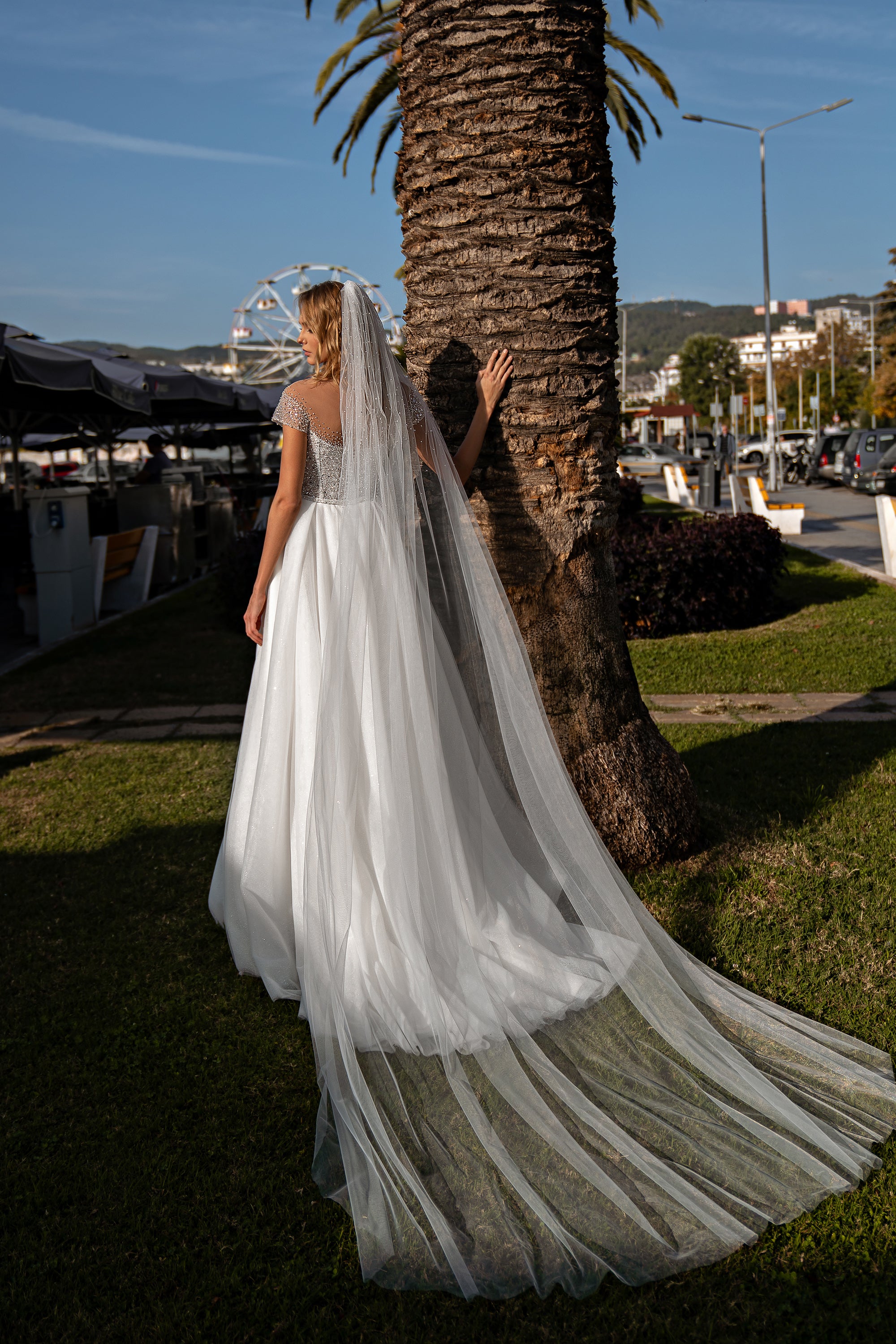 A-Line Wedding Dress with Over 1,000 Handmade Beads, Crystals and Sequins, Semi-Sheer Bodice, Hidden Lacing, Short Sleeves, Sequined Tulle Skirt and Thigh-High Slit