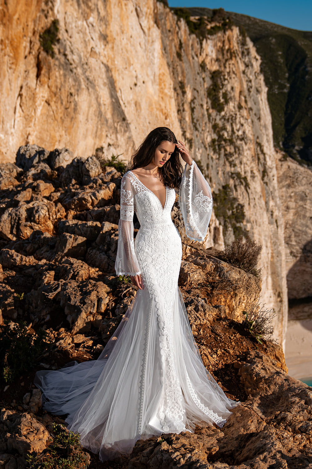 Luxurious Mermaid-Silhouette Wedding Dress with Long Flared Sleeves, Boho Lace, Guipure Embroidered with Sequins, and Deep Neckline