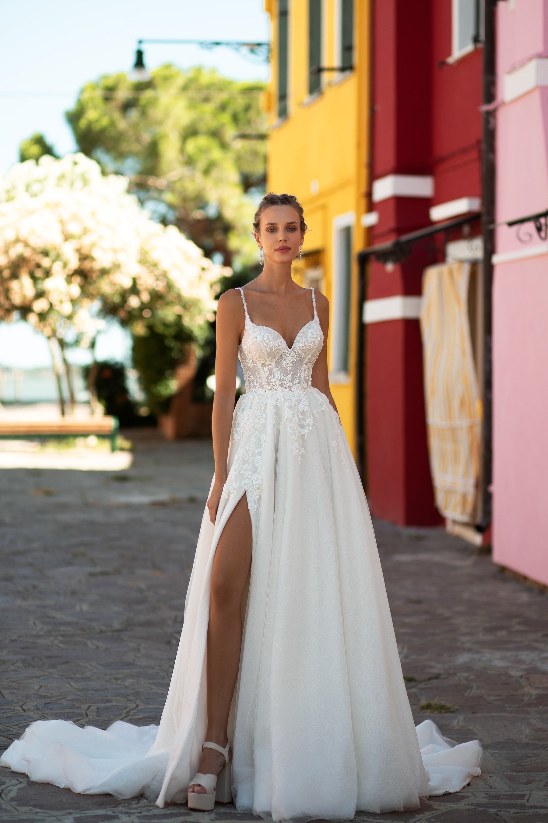 Elegant A-Line Wedding Dress with Slit Tulle Skirt, Lace Back with Buttons, Spaghetti Straps, and Detachable Cape