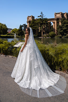Ball Gown Wedding Dress with Plunging V-Neckline and Bow Back