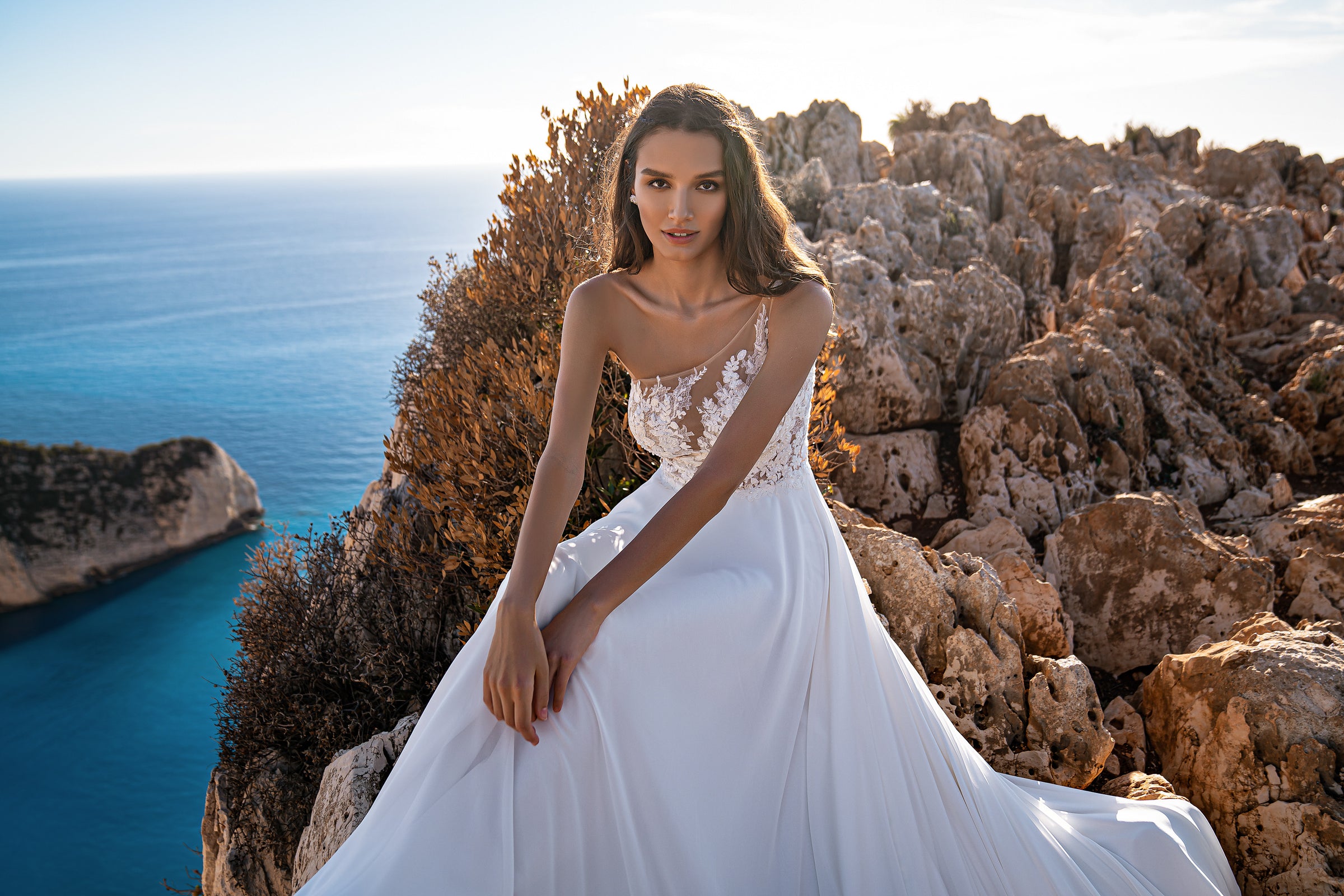 Exquisite Wedding Dress with Asymmetrical Corset, Soft Skirt, and Multi-Chiffon Train, Decorated with Floral Chantelle Appliques, Beads, Pearls, and Sequins, with Removable Element