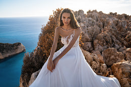 Exquisite Wedding Dress with Asymmetrical Corset, Soft Skirt, and Multi-Chiffon Train, Decorated with Floral Chantelle Appliques, Beads, Pearls, and Sequins, with Removable Element