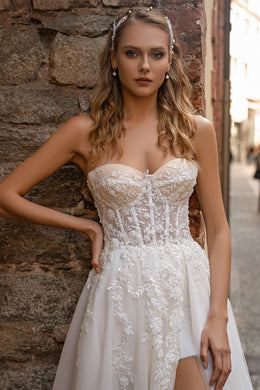 Modern Off-the-Shoulder Wedding Dress with Embroidered Floral Appliqués, Glitter Layers, and Lacing at the Back