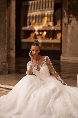 Elegant A-Line Bridal Dress with Tulle Sparkle Lace Skirt, Long Sleeves, and Nude Mesh Top