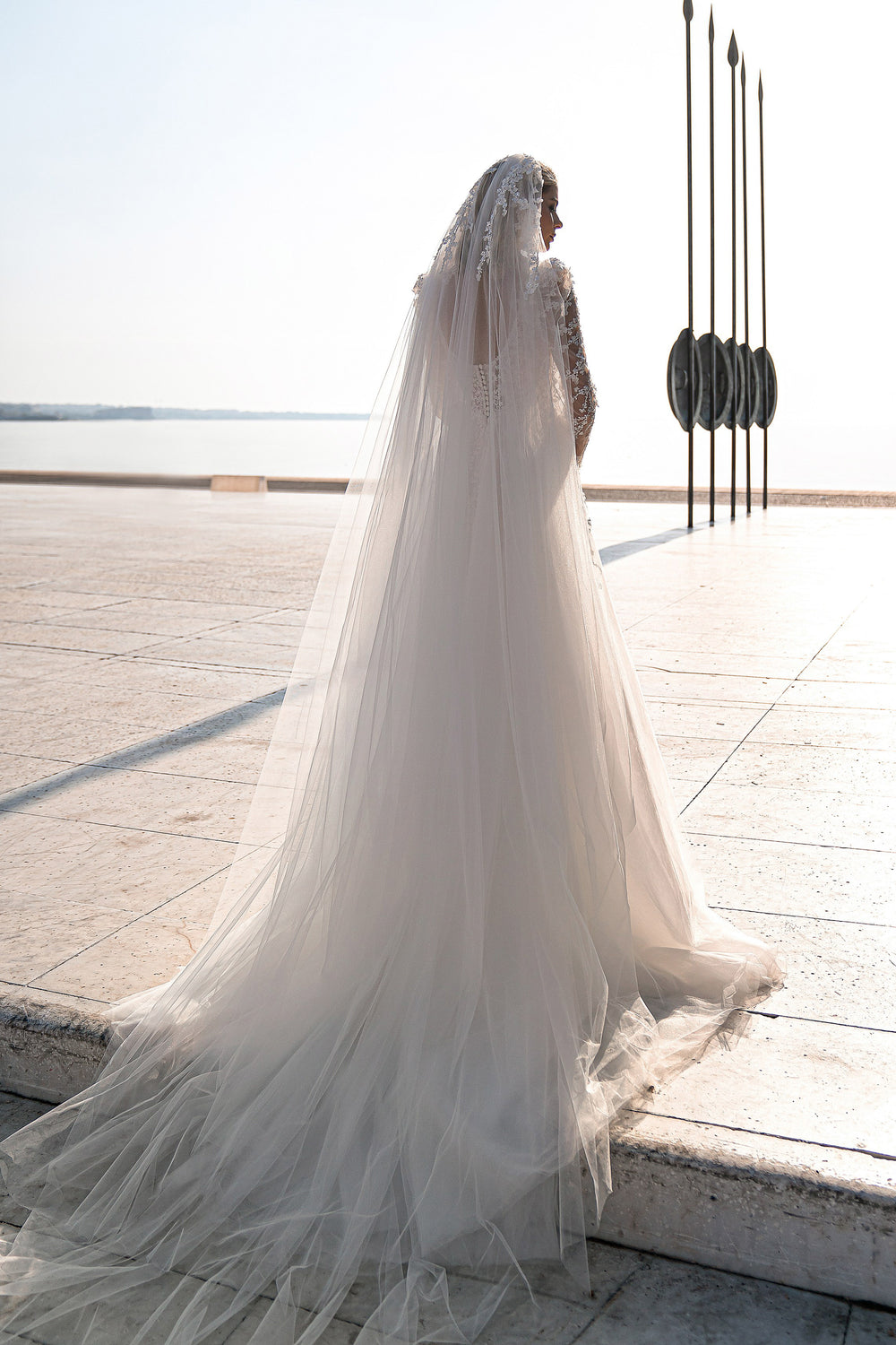 Elegant Sheath Wedding Dress with V-Neck, Long Lace Sleeves, and Tulle Skirt
