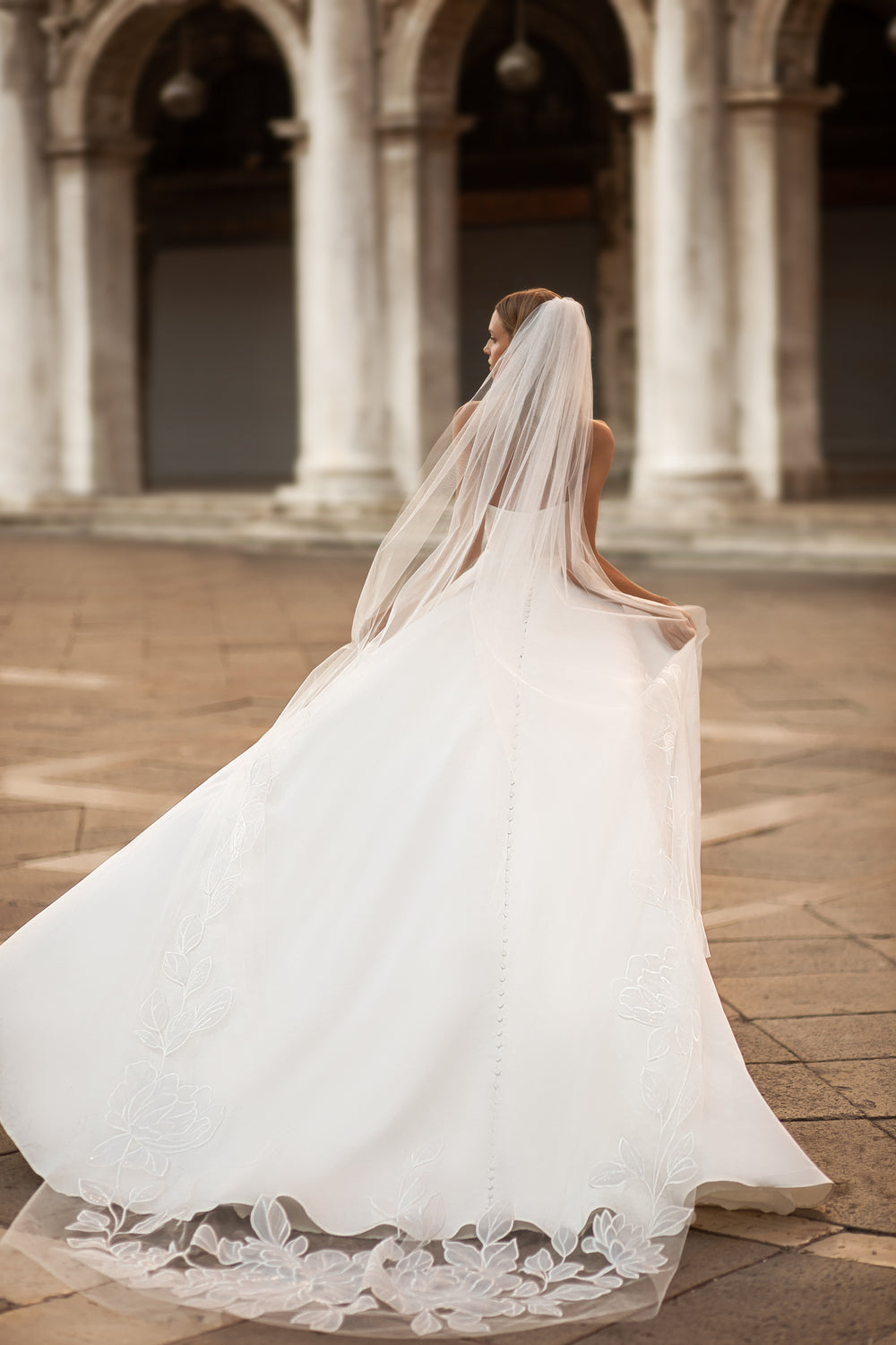 Sweetheart Wedding Gown with Detachable Long Sleeves, Slit Skirt, and Buttons Along the Low Back