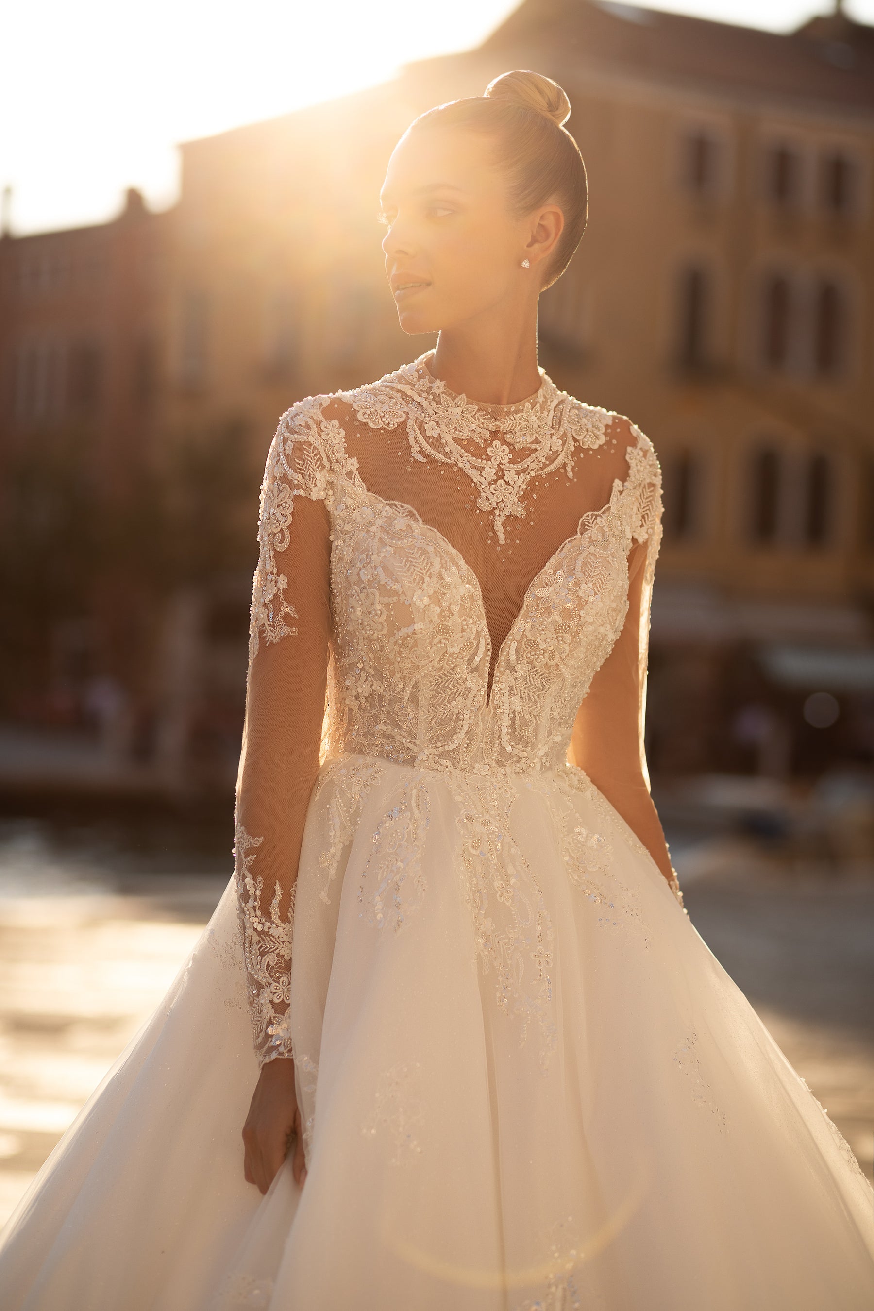Elegant Bridal Gown Ball Gown with Tulle Skirt Decorated with Lace, Long Lace Sleeves, and Beaded High Neck
