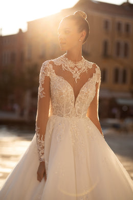 Elegant Bridal Gown Ball Gown with Tulle Skirt Decorated with Lace, Long Lace Sleeves, and Beaded High Neck