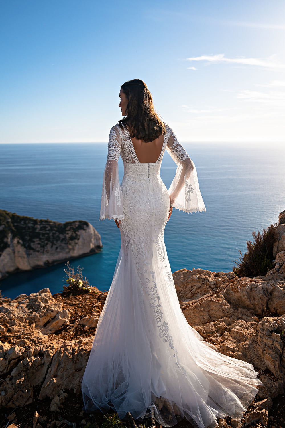 Luxurious Mermaid-Silhouette Wedding Dress with Long Flared Sleeves, Boho Lace, Guipure Embroidered with Sequins, and Deep Neckline