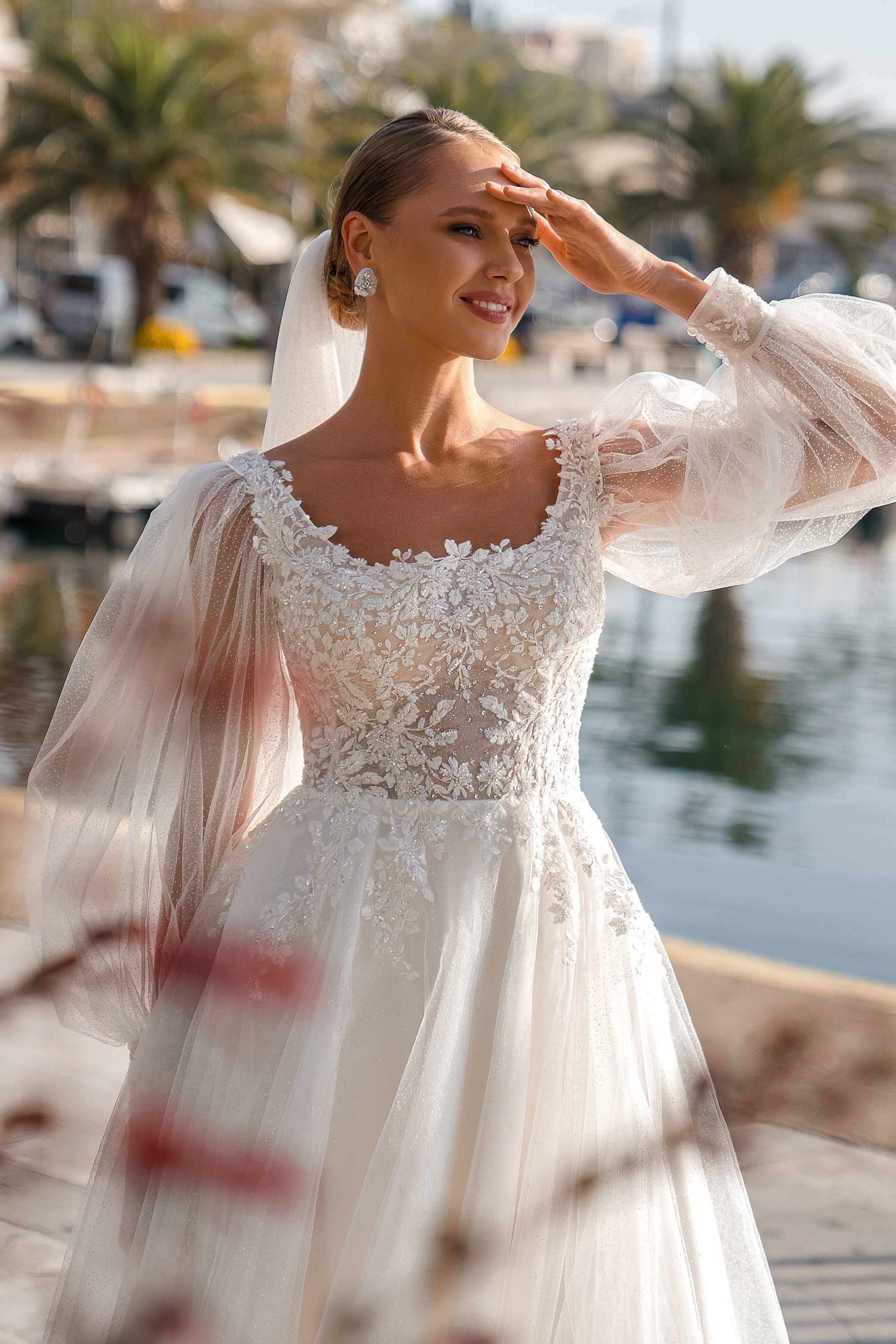 A-Line Wedding Dress with Detachable Voluminous Sleeves and Sparkling Tulle Skirt with Train