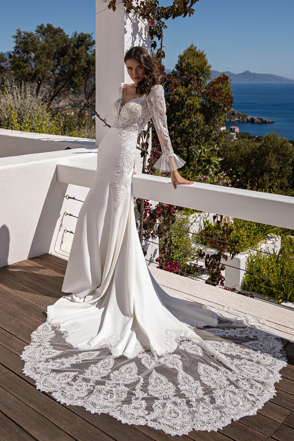 Beautiful Bridal Gown with Long Decorated Train, Detachable Puffy Sleeves, Semi-Sheer Deep Cut Front & V-Shaped Back, Stretch Crepe Skirt with Reliefs