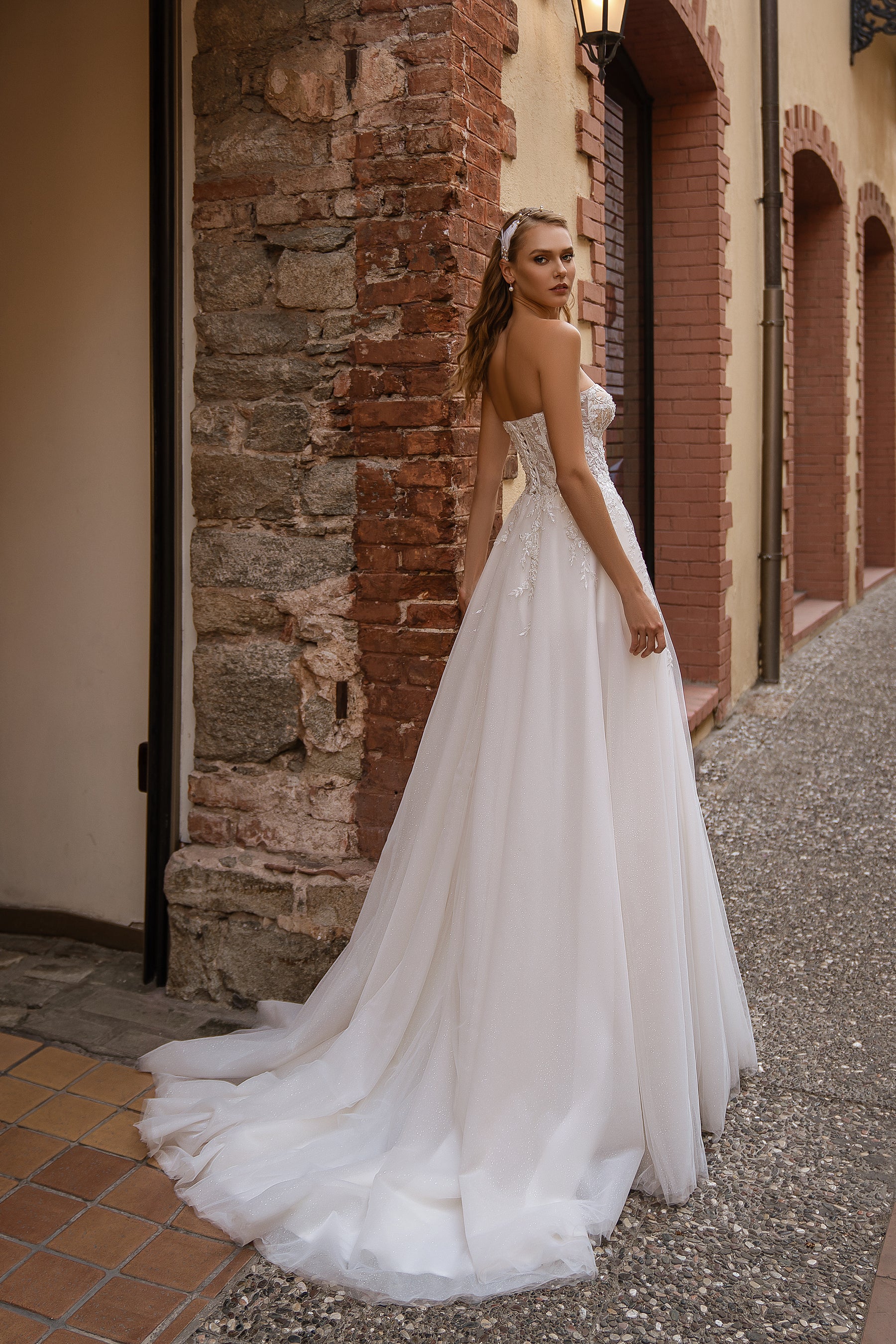 Modern Off-the-Shoulder Wedding Dress with Embroidered Floral Appliqués, Glitter Layers, and Lacing at the Back