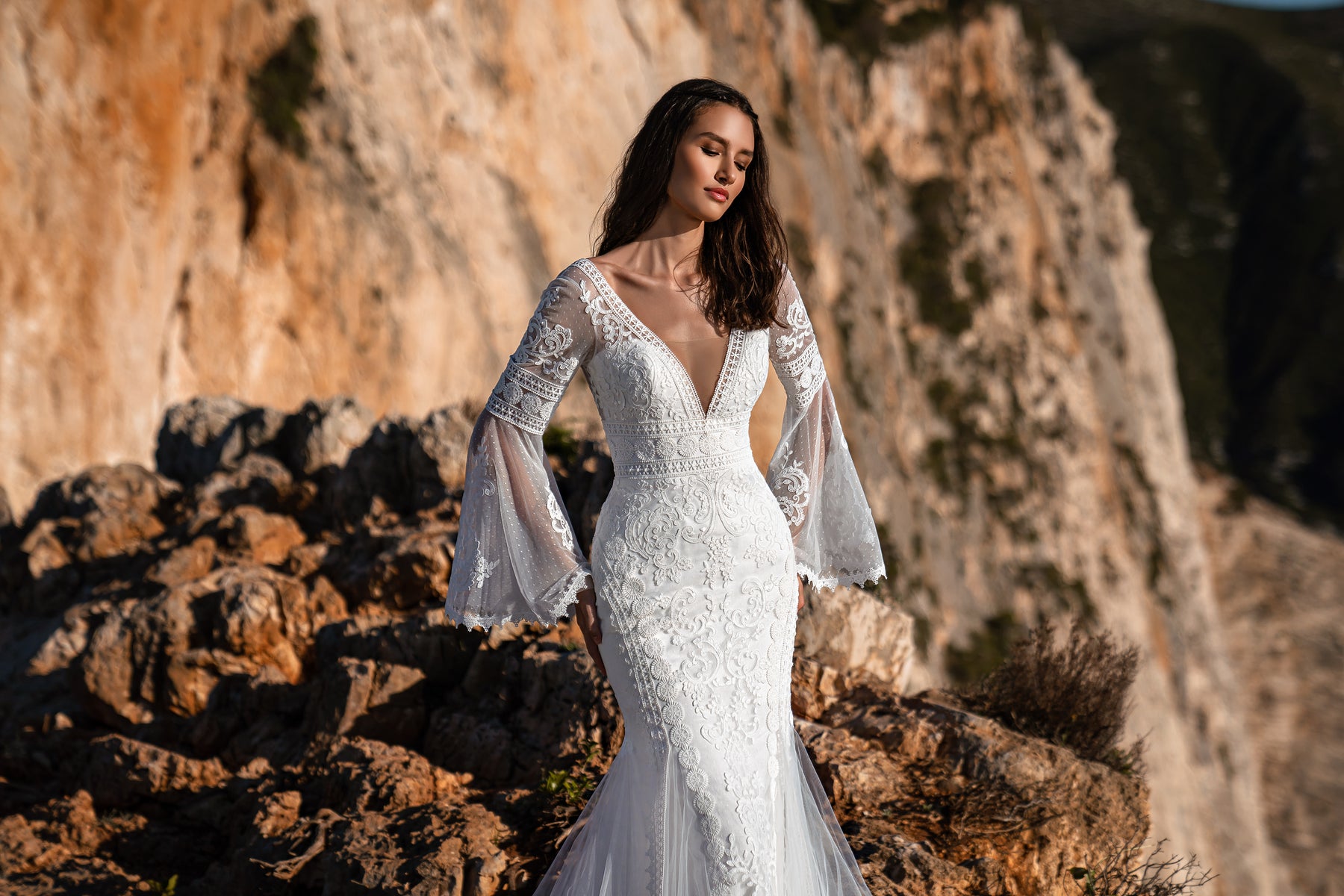 Mermaid Wedding Dress with Deep V-Neck and Flared Lace Sleeves
