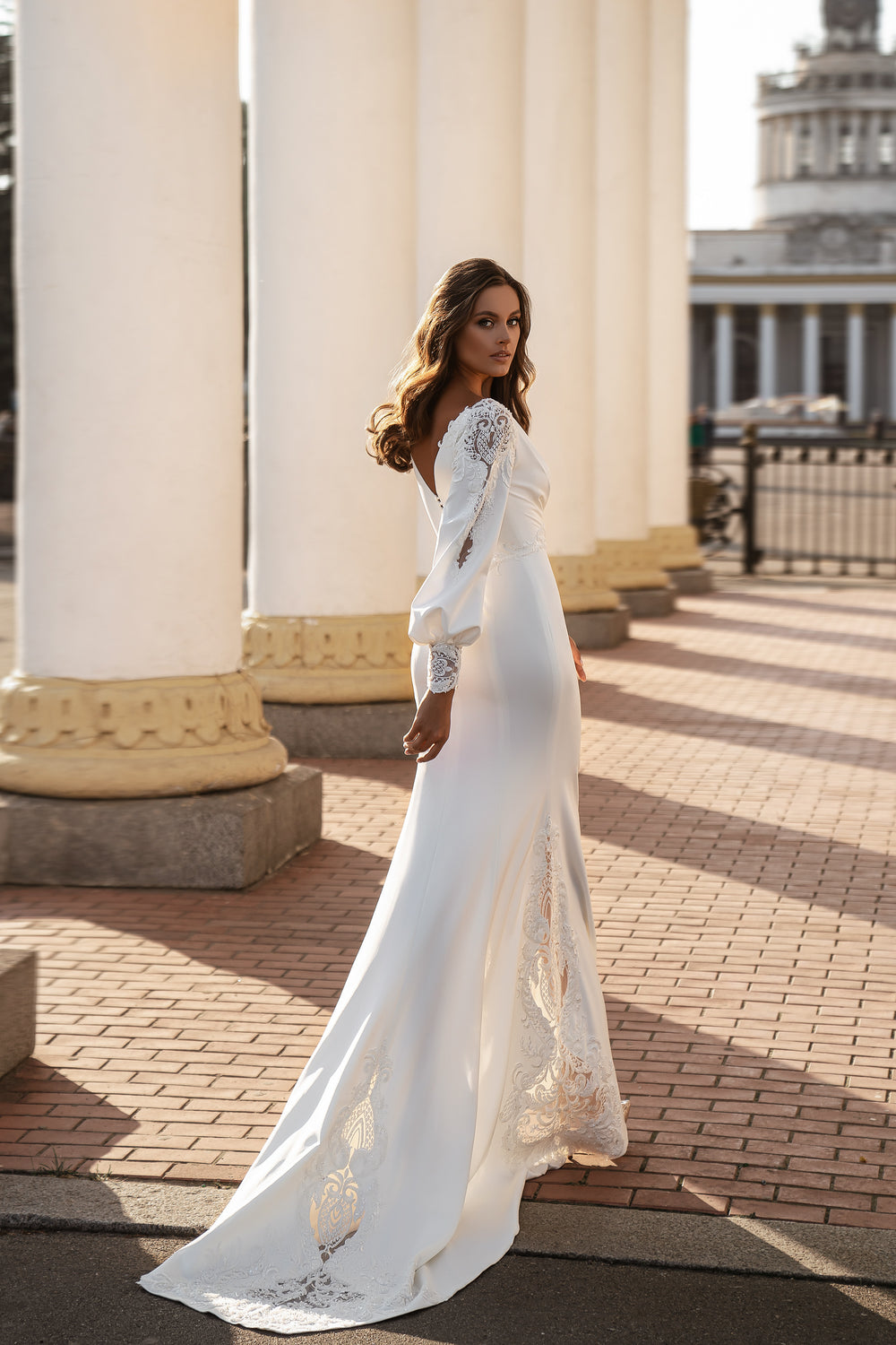 Mermaid Silhouette Wedding Dress with Long Lantern Sleeves and Embellished Guipure Bodice