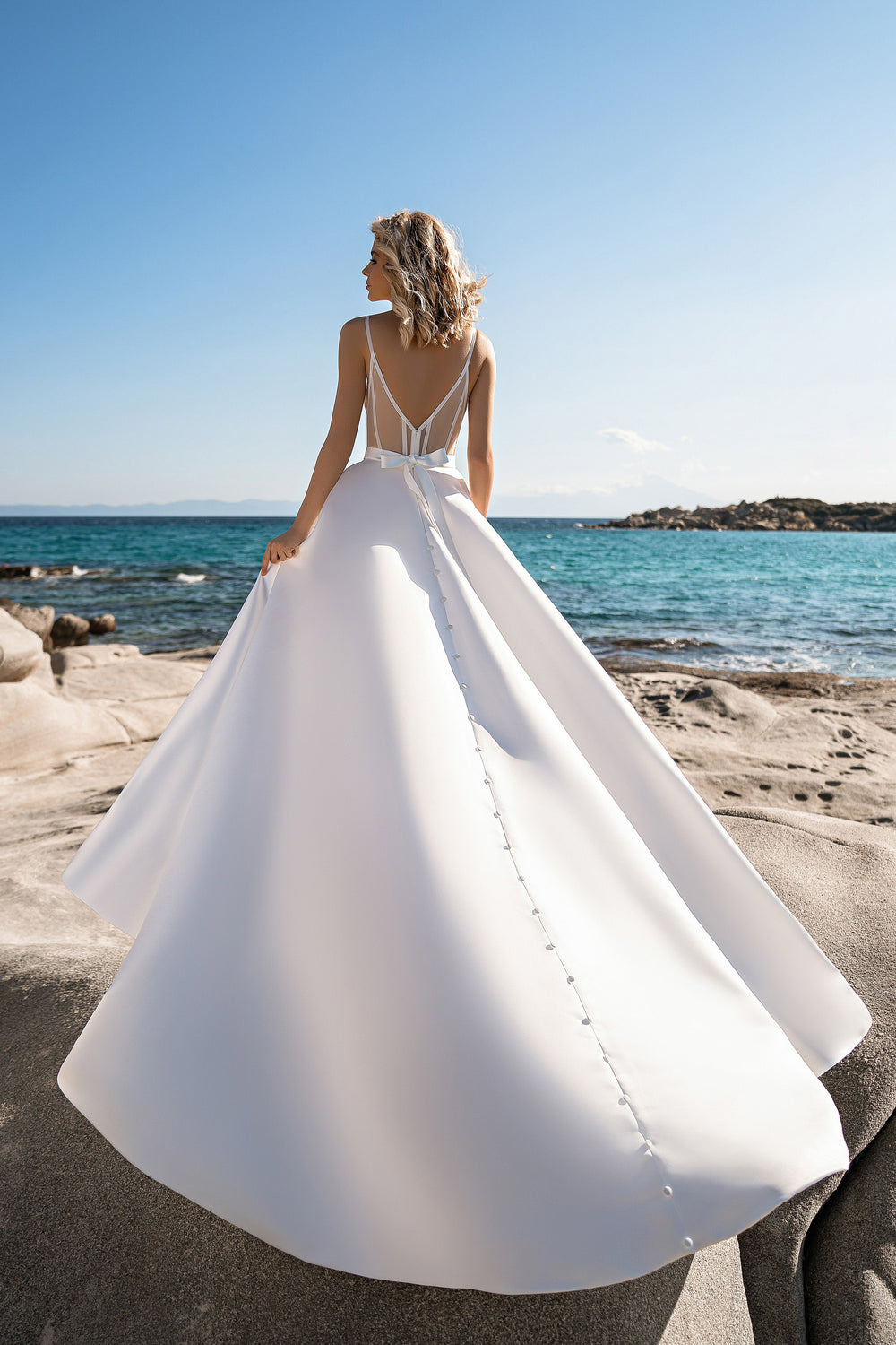Elegant V-Neck A-Line Wedding Dress with Spaghetti Straps and Chapel Train