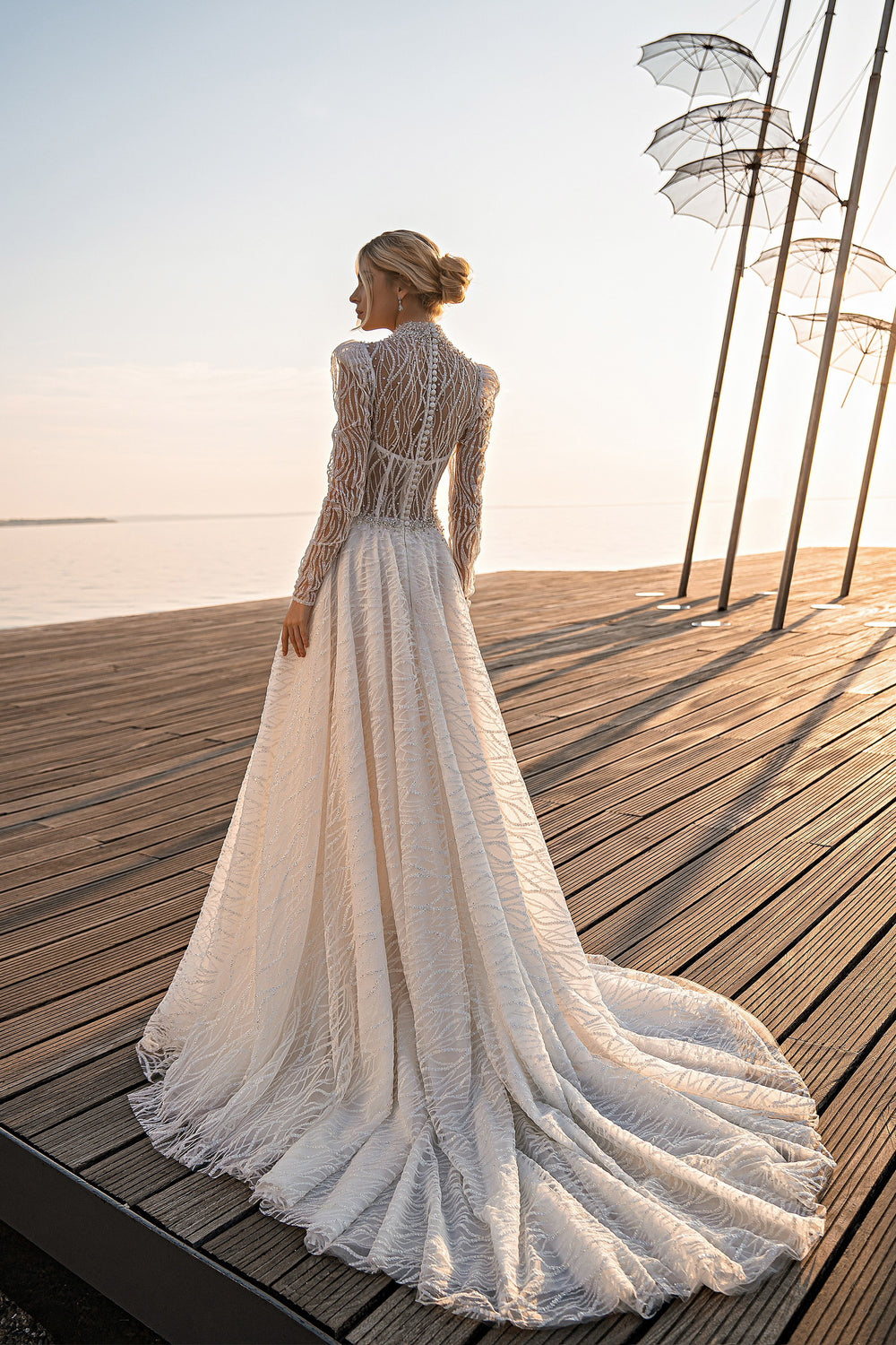 Beautiful Guipure Beaded Halter Neck Long Sleeve Sheath Wedding Dress with Sweep Train
