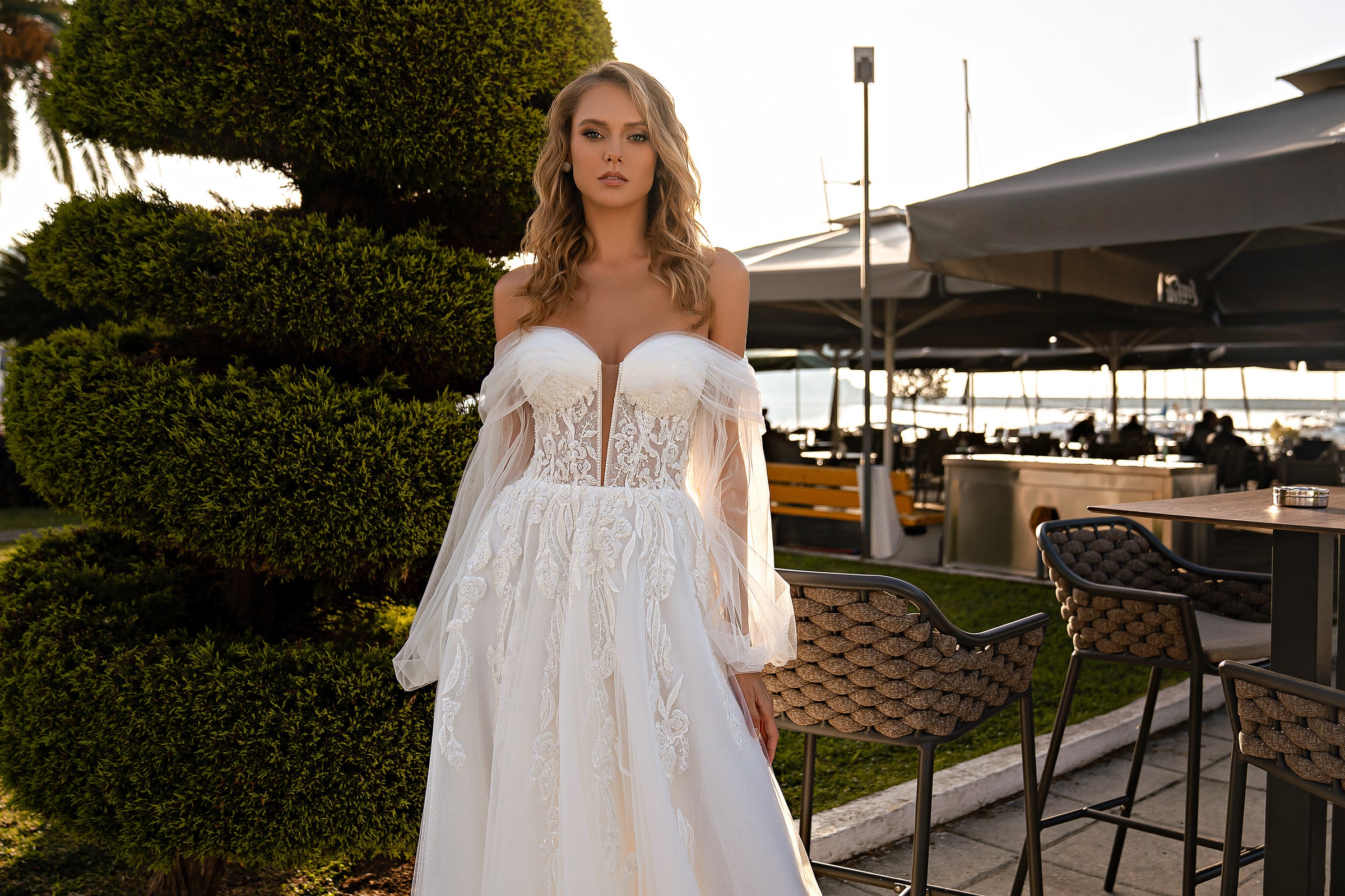 Gorgeous A-Line Wedding Dress with Detachable Voluminous Sleeves, Tulle Drapery, and Beaded Appliqués with Sequins