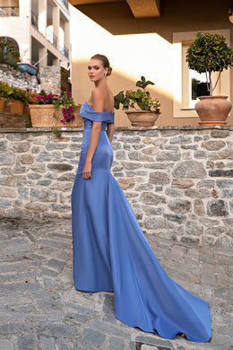 Side view of a blue mermaid evening dress with an off-the-shoulder neckline and sweeping train
