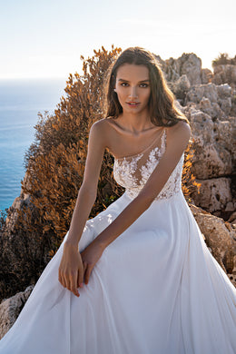 Exquisite Wedding Dress with Asymmetrical Corset, Soft Skirt, and Multi-Chiffon Train, Decorated with Floral Chantelle Appliques, Beads, Pearls, and Sequins, with Removable Element