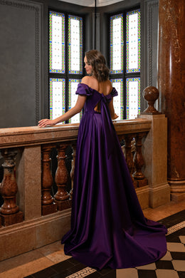 Purple evening dress with an open back, off-shoulder ruffled sleeves, and a sweeping floor-length train