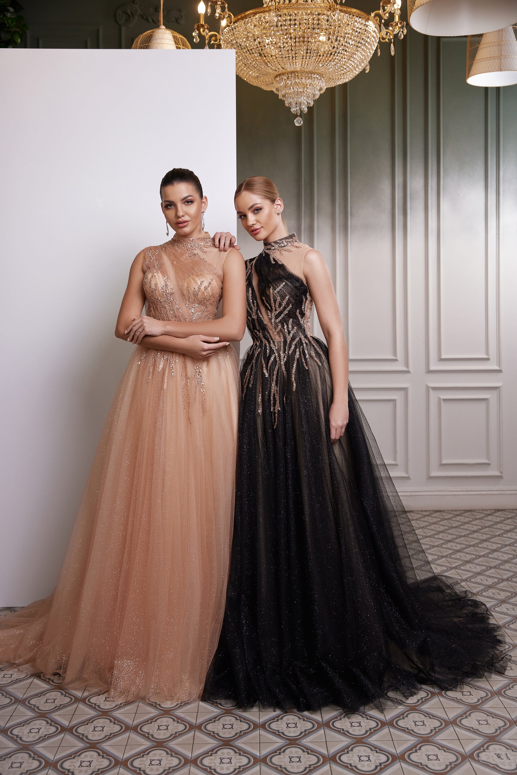 Champagne and black A-line tulle evening dresses with high necklines, sparkling embellishment, and full skirts