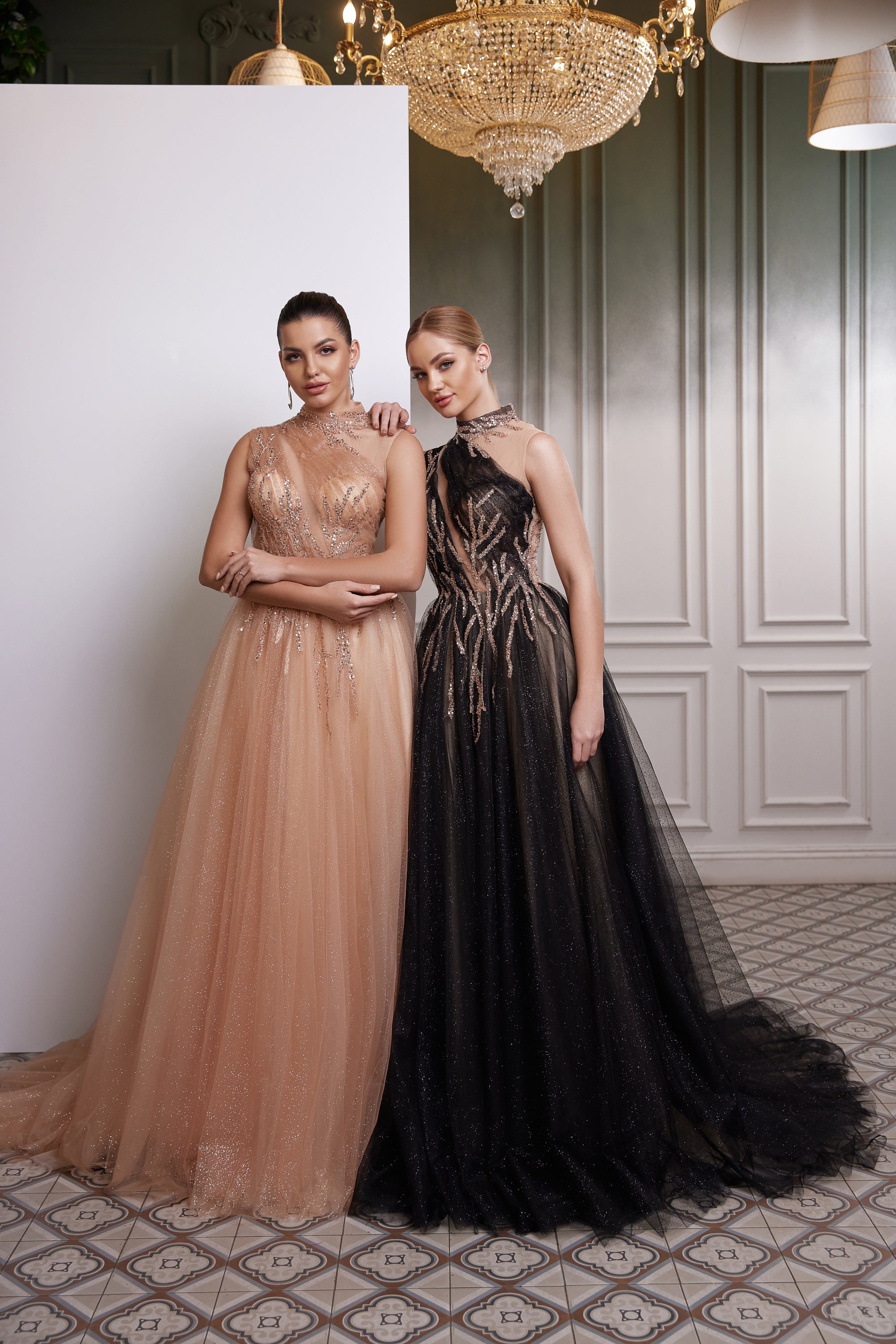 Champagne and black A-line tulle evening dresses with high necklines, sparkling embellishment, and full skirts
