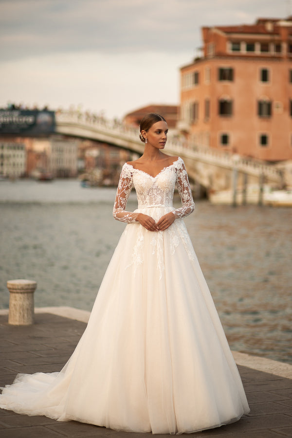 Elegant A-Line Wedding Gown with Tulle Skirt, Small Bow at Waist, Long Sleeves with Lace, Buttons Back, and Court Train