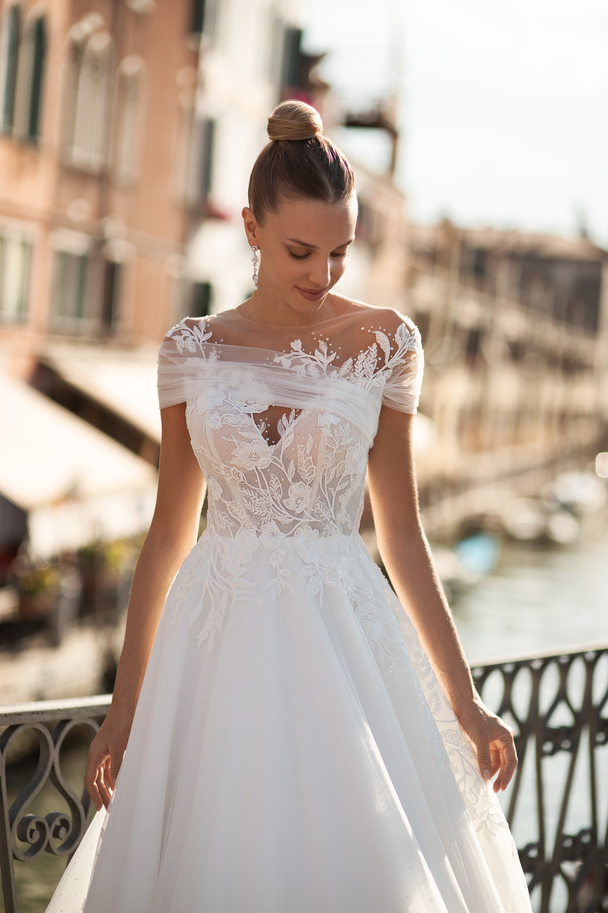 A-Line Bridal Dress with Tulle Fabric, Small Train, Lace Back with Buttons, Short Sleeves, and Flower Lace