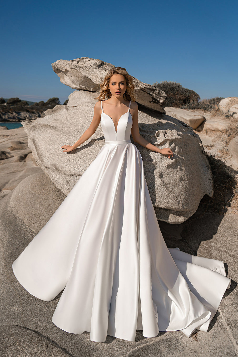 Elegant V-Neck A-Line Wedding Dress with Spaghetti Straps and Chapel Train