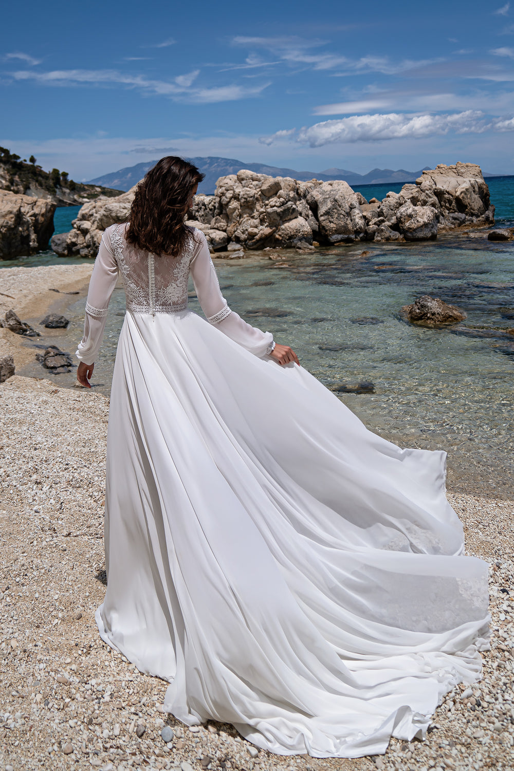 Beautiful Boho Style Wedding Dress with Guipure Embroidery, Lace Decor, and Long Train