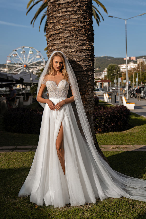 A-Line Wedding Dress with Over 1,000 Handmade Beads, Crystals and Sequins, Semi-Sheer Bodice, Hidden Lacing, Short Sleeves, Sequined Tulle Skirt and Thigh-High Slit