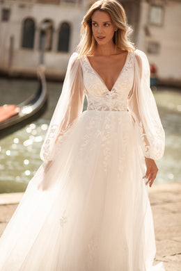 Rustic A-Line Wedding Gown with Tulle Fabric, Puffy Sleeves, V-Neck, and Open Back