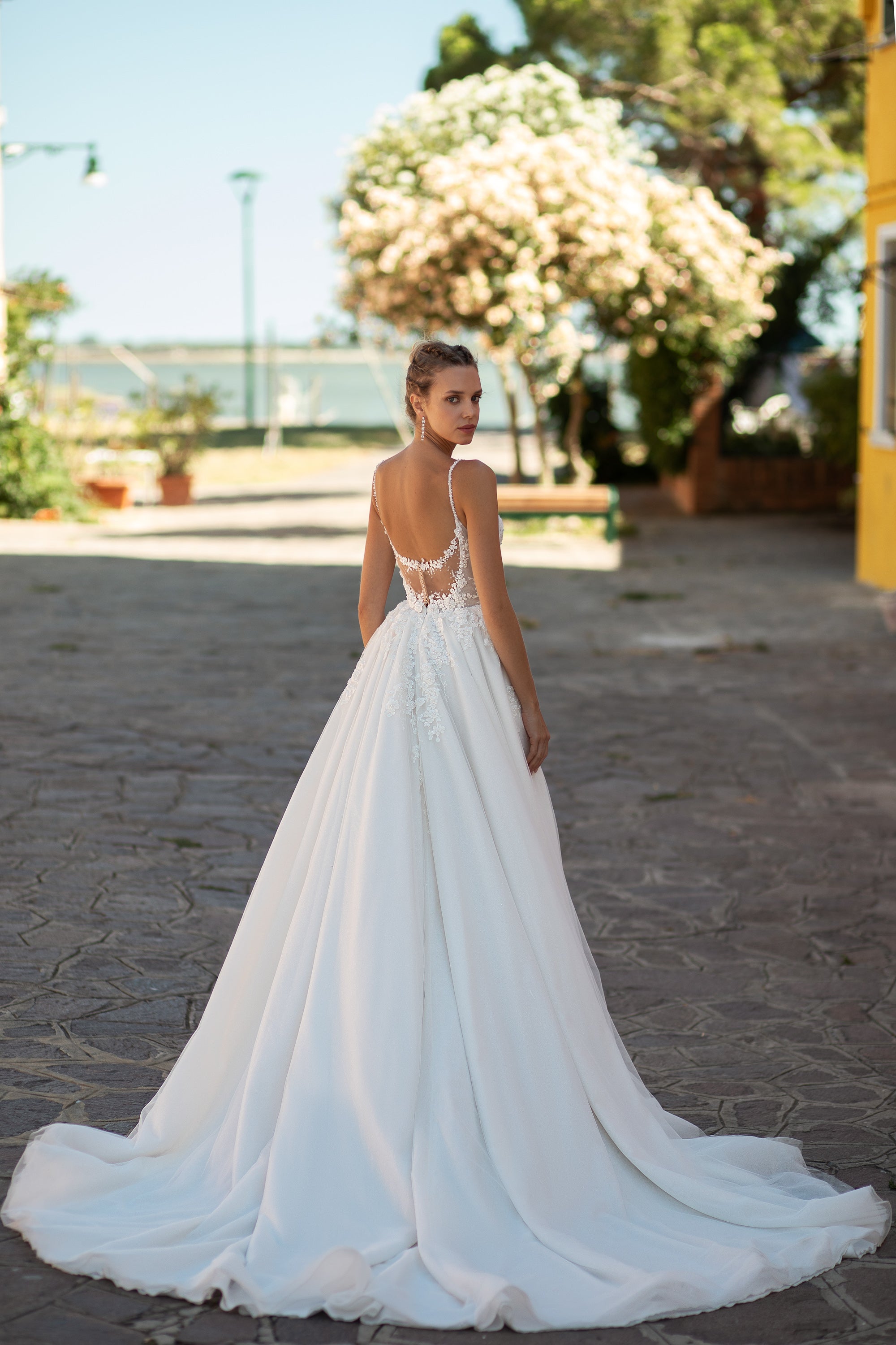 Elegant A-Line Wedding Dress with Slit Tulle Skirt, Lace Back with Buttons, Spaghetti Straps, and Detachable Cape